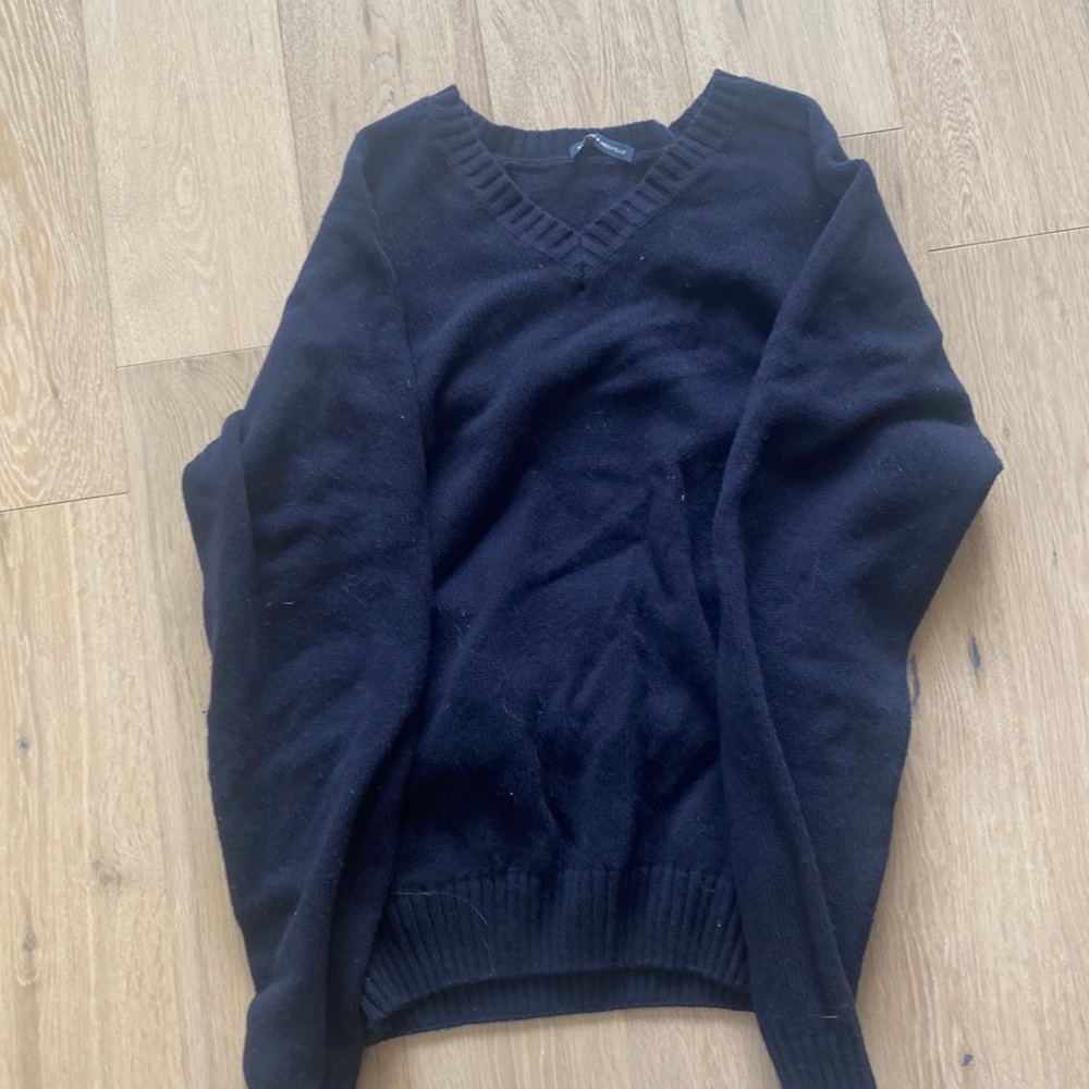 brand melville dark blue sweater kinda itchy but super cute over sized